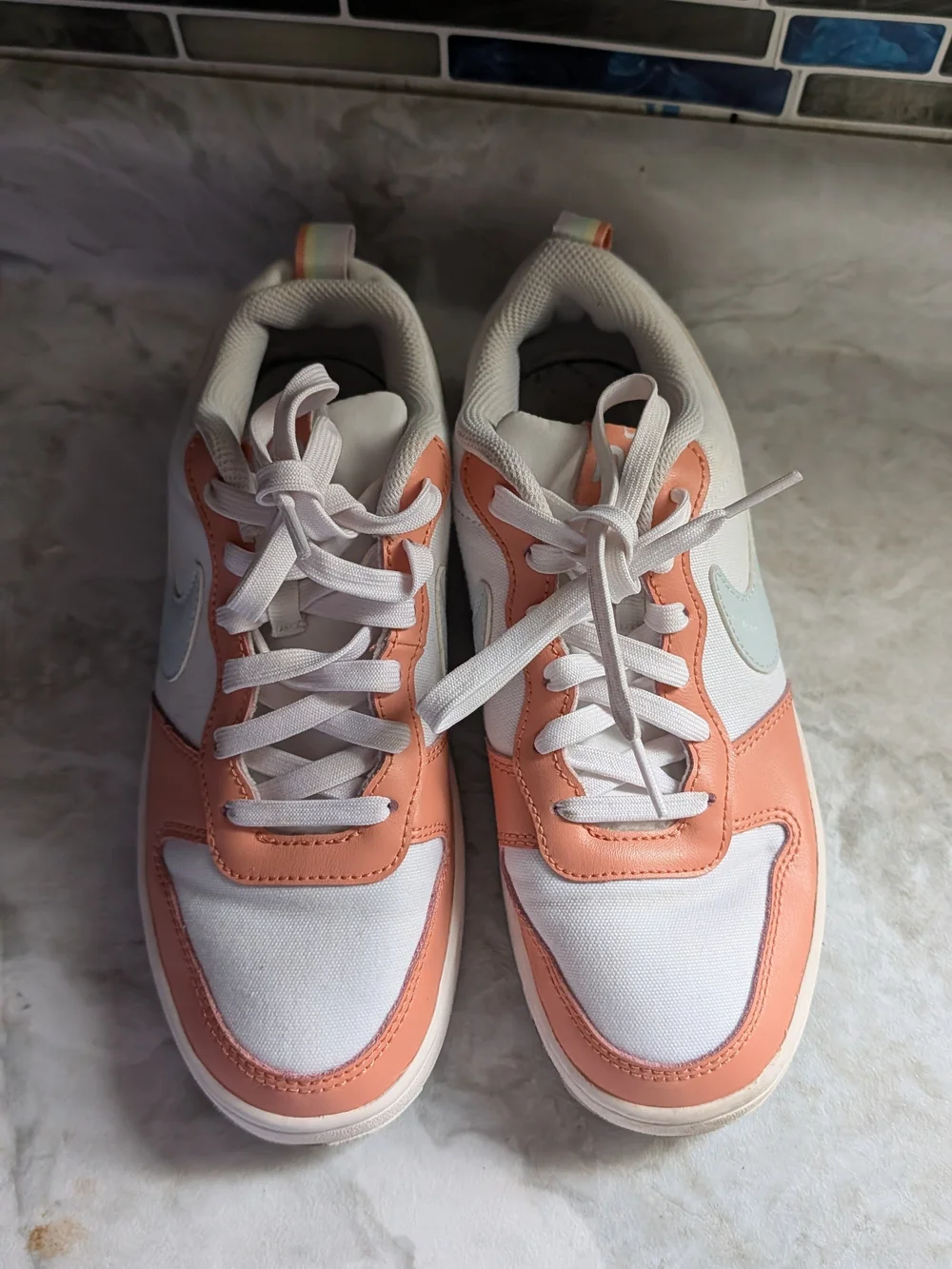 Nike Women’s Low-Top Sneakers in White and Peach